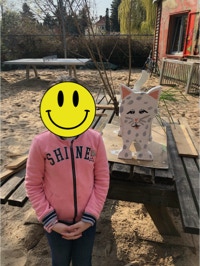 Blumenkasten katze mit kind